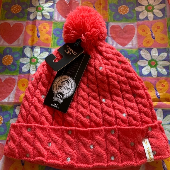 O’Neill Women Dot Beanie with Pom Pom in Coral colour - Picture 1 of 3